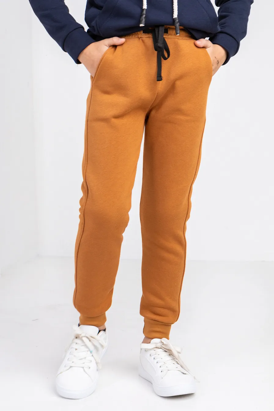 Дитячі спортивні штани Stimma Арістоль, колір - карамельний